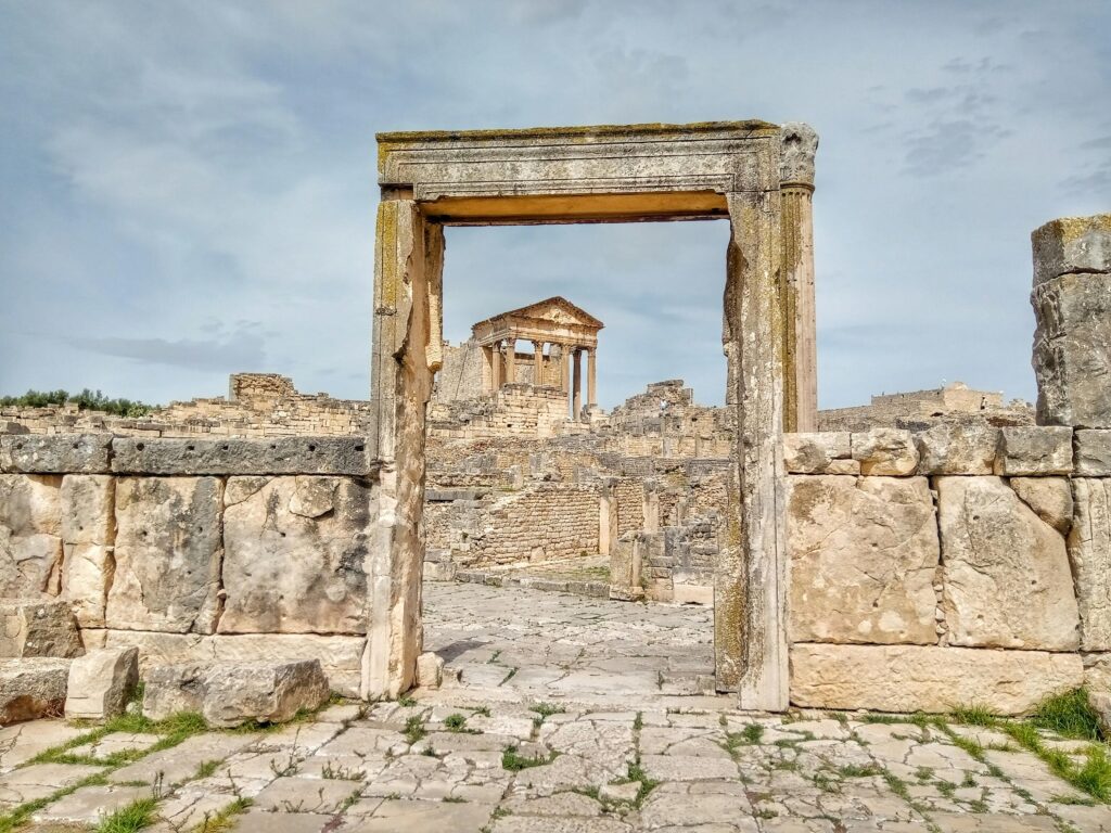 Discover the ancient Roman ruins of Dougga, capturing historical splendor in Tunisia.